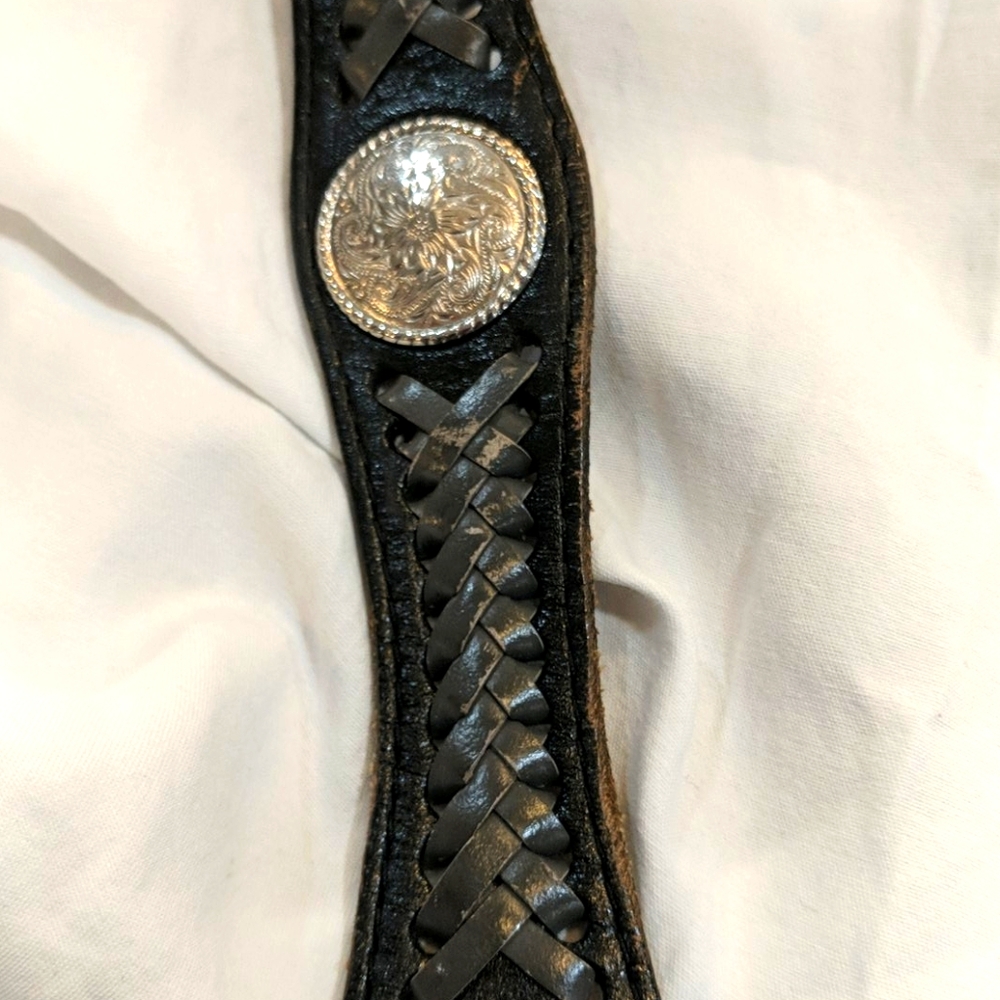 Black braided rawhide belt.